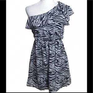 Eyelash couture black and white dress.